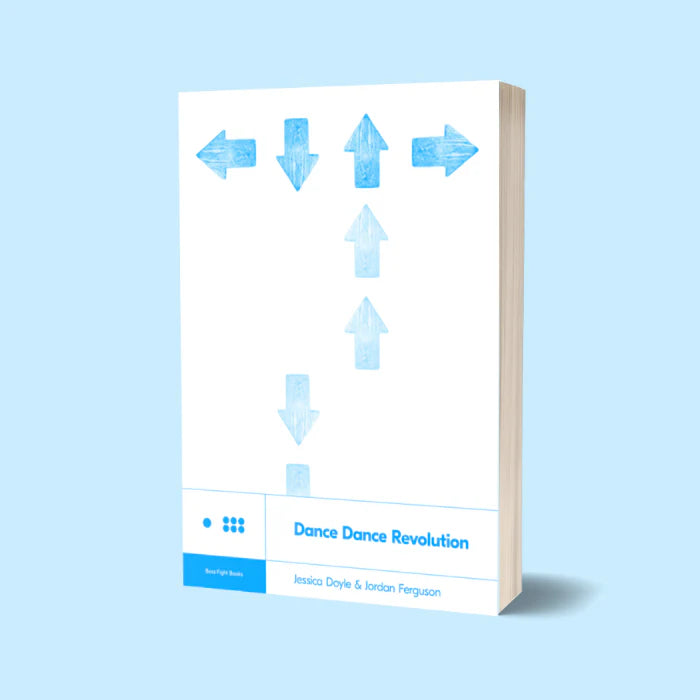 Book titled 'Dance Dance Revolution' with blue arrows on a light blue background