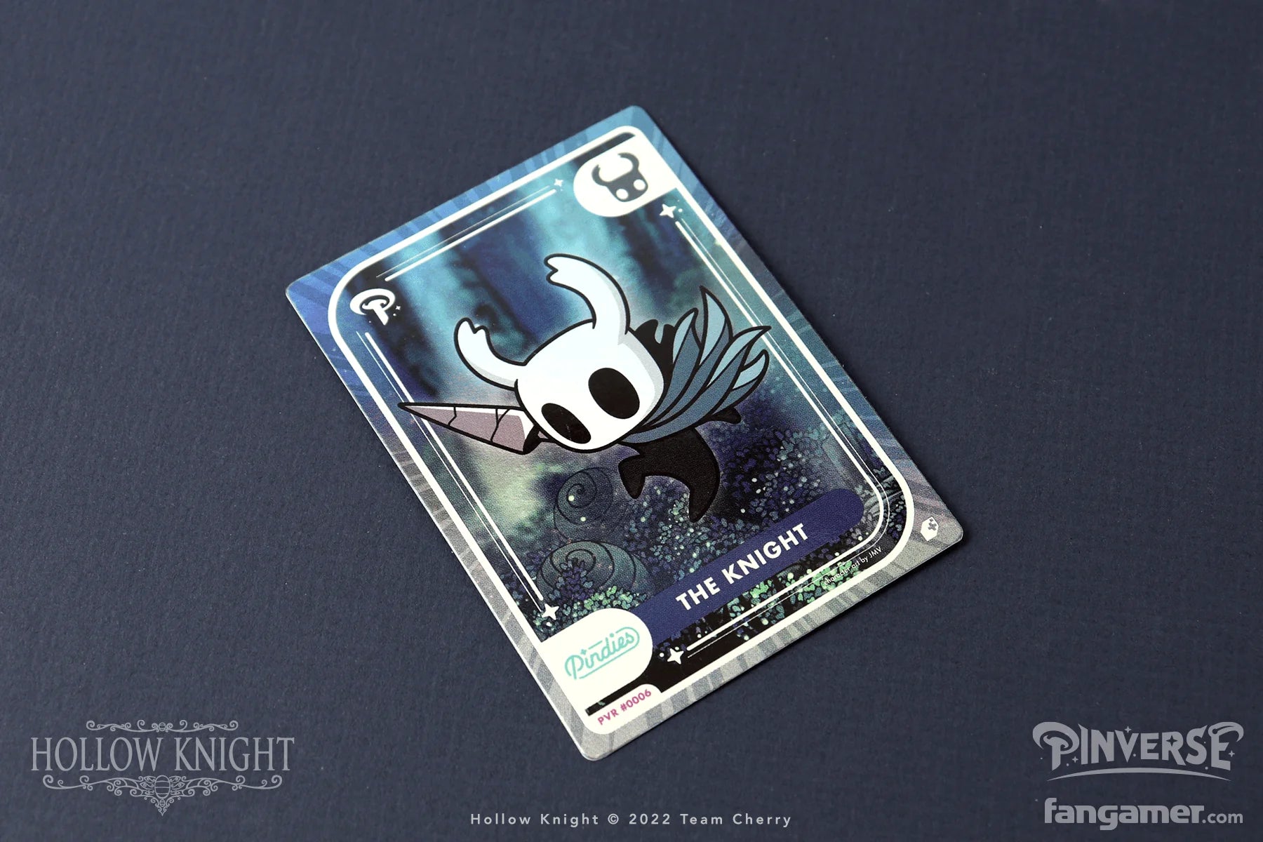 Trading card featuring a character from 'Hollow Knight' on a dark background