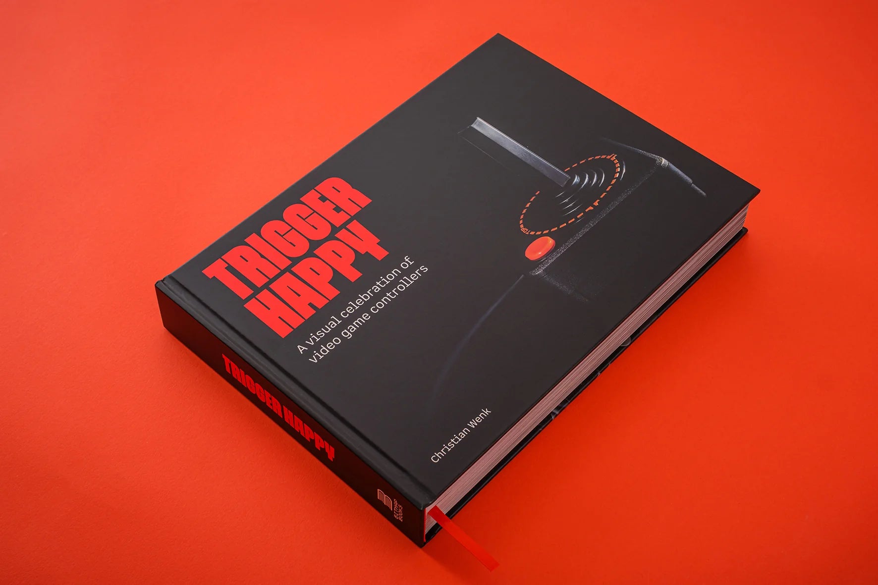 Book titled 'Trigger Happy' on a red background