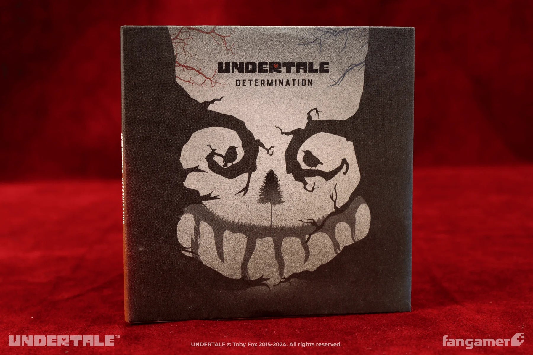 Product packaging for 'Undertale' with a skull design on a red background